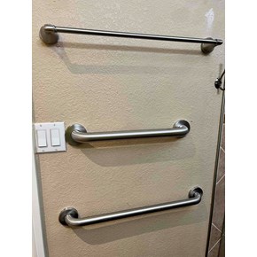 Installed shower grab bars