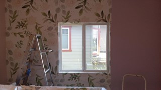 After wallpaper install in new baby room 