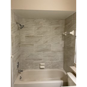 bathroom after project in Land O Lakes, featuring new shower tile. 