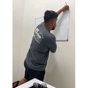 Hanging drywall board in office space - Panama City Beach, FL