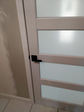 Ace Handyman Services Pilates Studio 5 panel door handle installation after photo in Port St. Lucie, FL