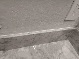 Ace Handyman Services bathroom recaulking and paint touch-up after photo in Port St. Lucie, FL