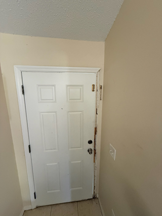 Ace Handyman door frame repair before photo in Port St. Lucie, FL