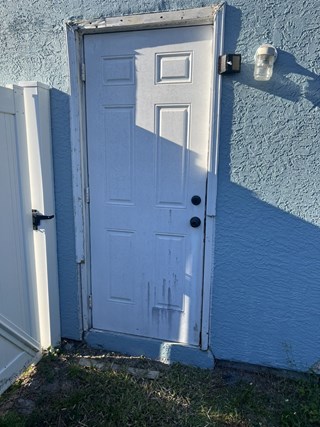 Ace Handyman Pilates door replacement before photo in Port St. Lucie, FL
