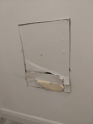 Ace Handyman Services drywall patch before in Port St. Lucie, FL