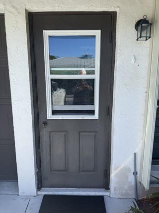 Ace Handyman Services hurricane shutters installation before photo in Port St. Lucie, FL