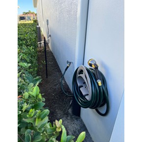Ace Handyman Services garden hose reel mounting in Port St. Lucie, FL