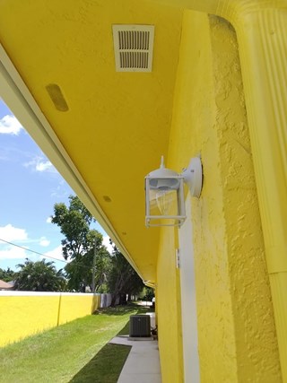 Ace Handyman Services office exterior light fixture after in Port St. Lucie, FL