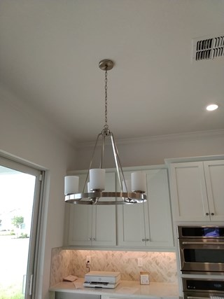 Ace Handyman Services light fixture before in Port St. Lucie, FL
