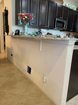 Ace Handyman Services baseboard re-installation project in Port St. Lucie, FL