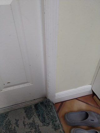 Ace Handyman Services door frame before in Port St. Lucie, FL