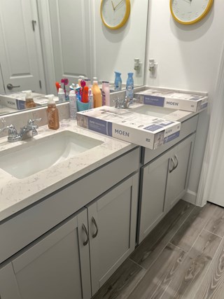 Ace Handyman Services bathroom faucet replacement before photo in Port St. Lucie, FL