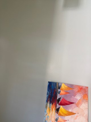 Ace Handyman Services painting hanging before photo in Port St. Lucie, FL