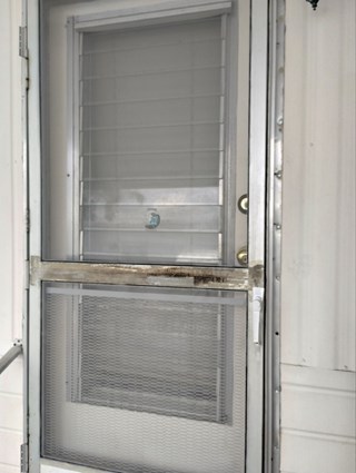 Ace Handyman Services screen door repair project in Port St. Lucie, FL