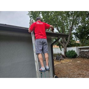 Cleaning out gutters in Sarasota