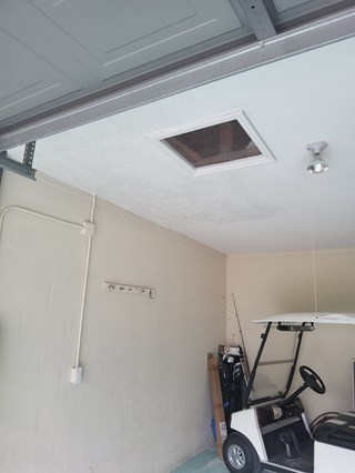 Drywall repair in garage ceiling