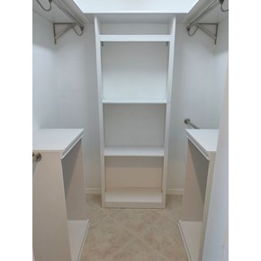 Space-saving closet organizer with shelving and shoe rack in Sarasota