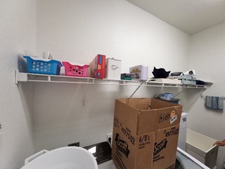 Laundry room area before additional storage is added