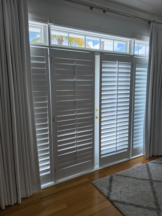 French doors after plantation shutter installation 