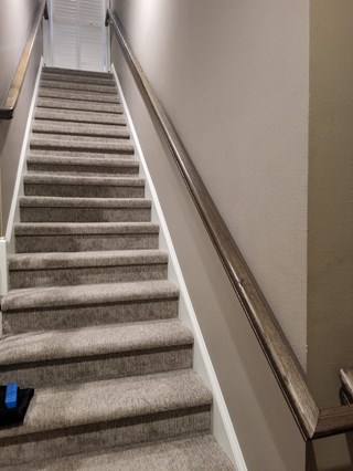 Interior custom stained handrail installation 