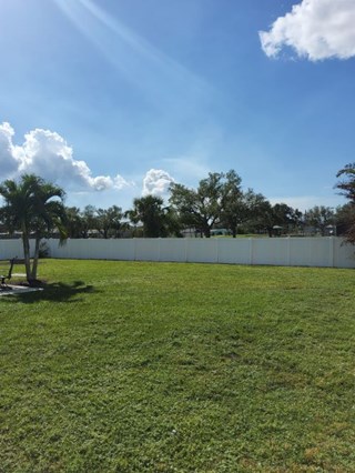 Exterior vinyl fence post set and vinyl slats repaired