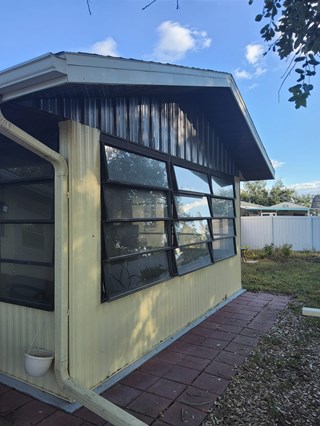 Vinyl siding and soffit was repaired same day, leaving this home looking good as new!