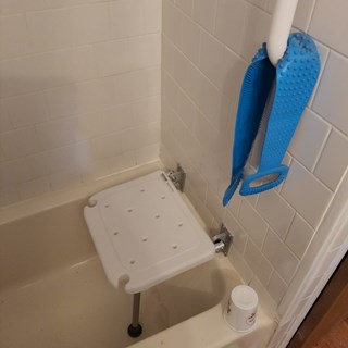 Bathtub with shower bench installation