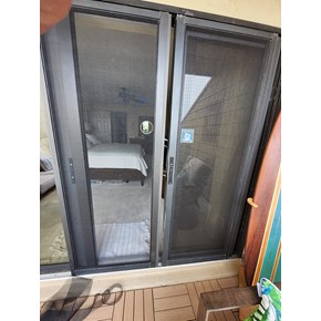 Rescreening this door in sunny Siesta Key