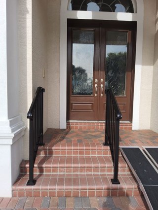 Railings installed so customer can safely climb these stairs