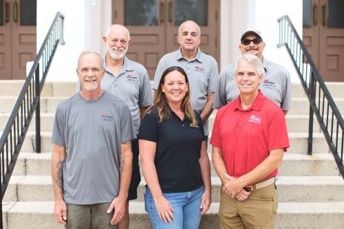 Ace Handyman Services Lanier Team of Craftsman pose for a picture in front of their office Ace Handyman Services Lanier Team of Craftsman pose for a picture in front of their office