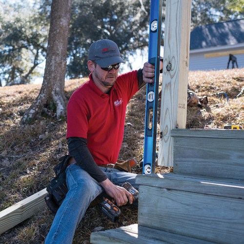 Ace Handyman repairing a deck in Illinois