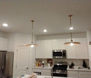 Ace Handyman Services of Lincoln Way replaced can lights with hanging after