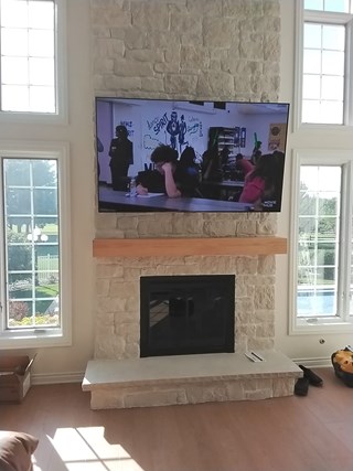 Ace Handyman Services of Lincoln Way installed a mantel & TV after