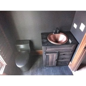 Ace Handyman Services of Lincoln Way replaced subflooring, flooring, painted the walls and ceiling, vanity, a custom made vanity top and a toilet