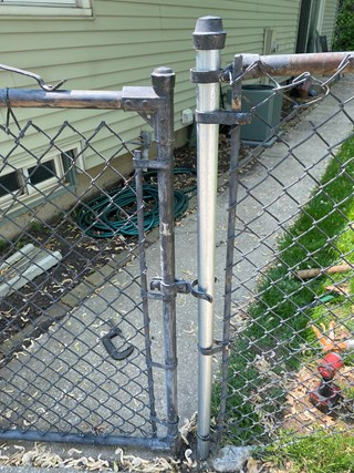 Ace Handyman Services repaired a chain link fence post that was bent