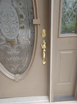 Ace Handyman Services of Lincoln Way cleaned and re-painted front door and changed handle with lock before