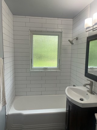 Ace Handyman Services of Lincoln Way installed glass shower doors before