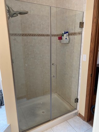 Ace Handyman Services of Lincoln Way shower door style change out after