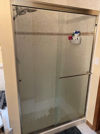 Ace Handyman Services of Lincoln Way shower door style change out before