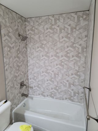 Ace Handyman Services of Lincoln Way replaced shower tile 