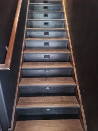Ace Handyman Services of Lincoln Way installed flooring with stair lighting after
