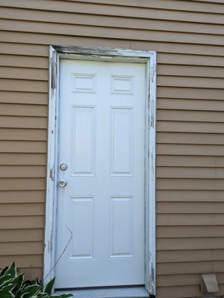 Ace Handyman Services of Lincoln Way garage door trim before