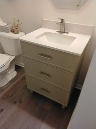 Ace Handyman Services of Lincoln Way replaced a pedestal sink with a vanity after