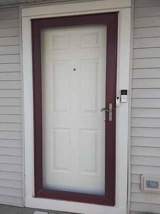 Ace Handyman Services of Lincoln Way replaced a storm door before