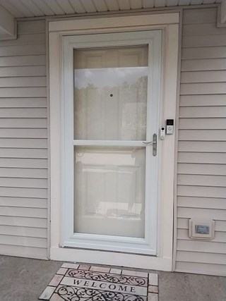Ace Handyman Services of Lincoln Way replaced a storm door after