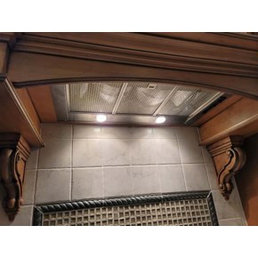 Ace Handyman Services of Lincoln Way re-secured a range hood that fell out