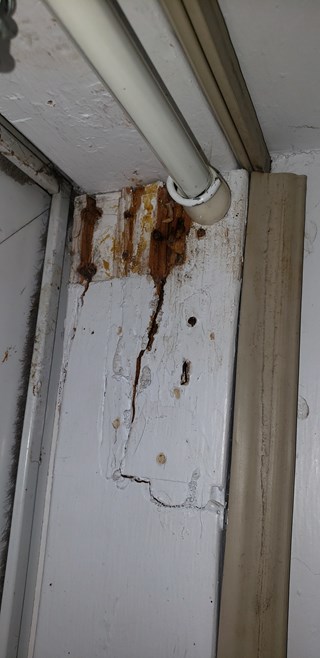 Ace Handyman Services of Lincoln Way door frame repair before