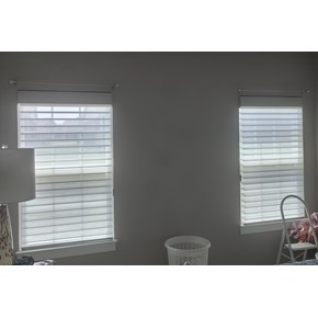 Ace Handyman Services of Lincoln Way installed curtain rods in a bedroom