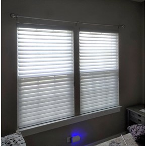 Ace Handyman Services of Lincoln Way installed a curtain rod in a bedroom