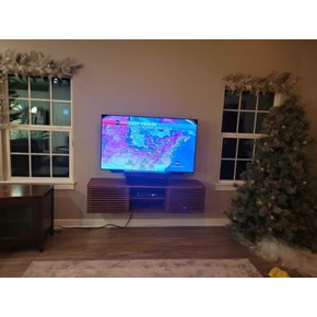 Ace Handyman Services of Lincoln Way assembled and hung a TV console 